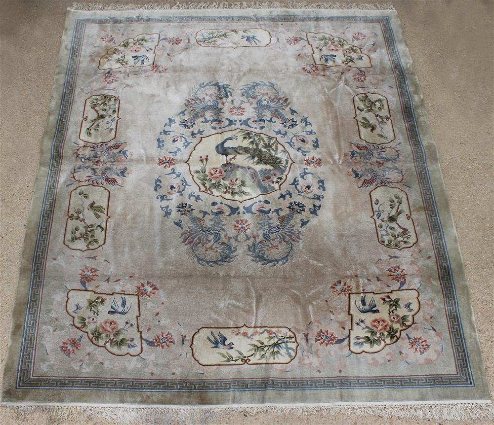 Appraisal: LARGE CHINESE SILK RUG central medallion with peacock surrounded by