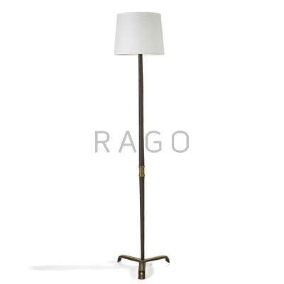 Appraisal: JACQUES ADNET Floor lamp France s Stitched leather bronze linen