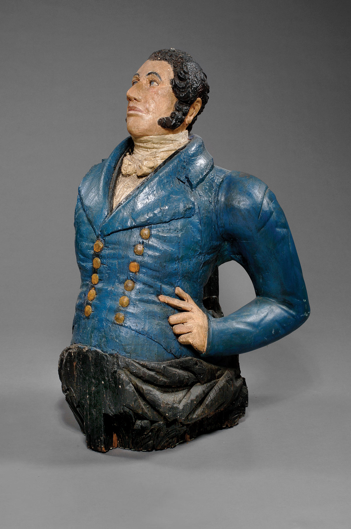 Appraisal: CARVED AND PAINTED HALF-LENGTH FIGUREHEAD OF A MASTER MARINER CIRCA