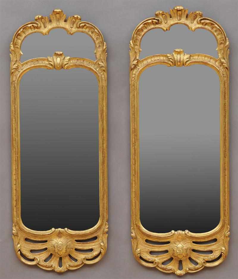 Appraisal: PAIR OF SWISS ROCOCO GILTWOOD MIRRORS Each with a pierced