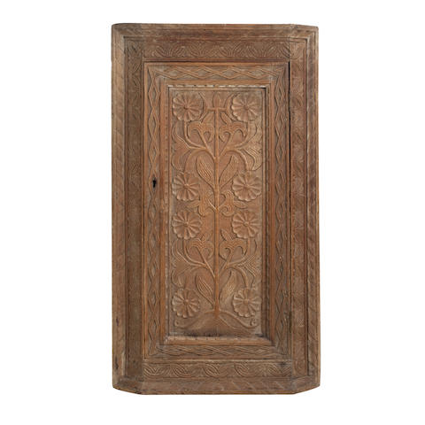 Appraisal: A late th or early th century carved oak corner