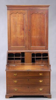 Appraisal: CHIPPENDALE WALNUT SECRETARY BOOKCASE The flat cornice above a pair