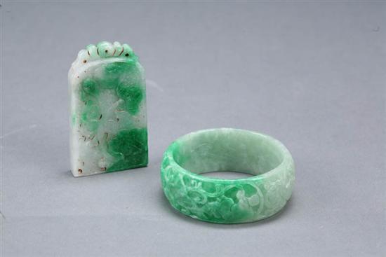 Appraisal: THREE BANGLE BRACELETS China th century Mutton fat nephrite jade