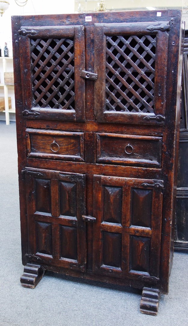 Appraisal: A th century Spanish chestnut food cupboard with pair of