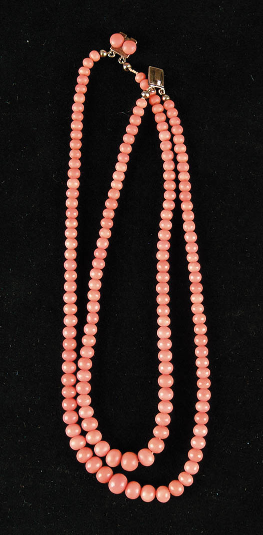 Appraisal: TWO STRAND CORAL NECKLACE Unmarked gold clasp with two graduated