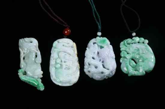 Appraisal: FOUR CHINESE APPLE GREEN AND LAVENDER JADEITE PENDANTS Carved to