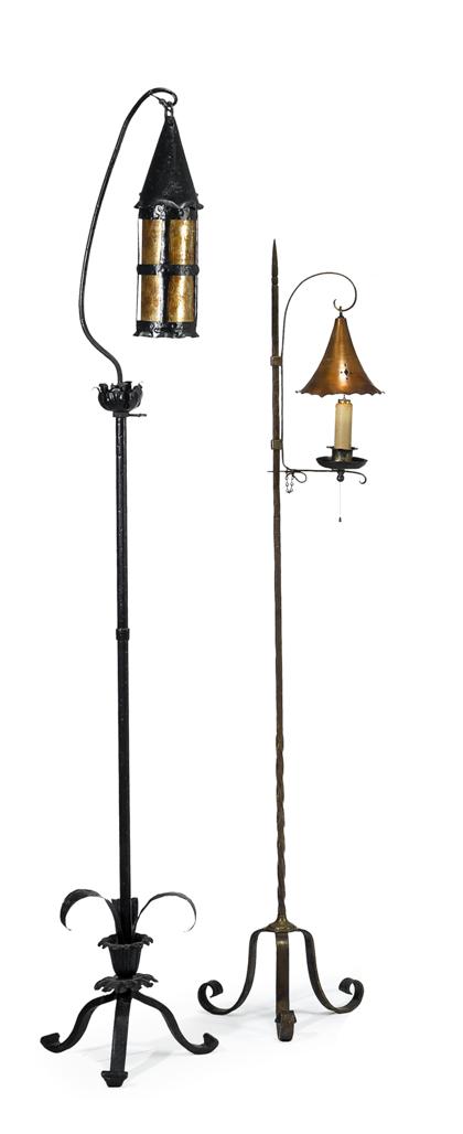 Appraisal: Two wrought iron and metal floor lamps The first having