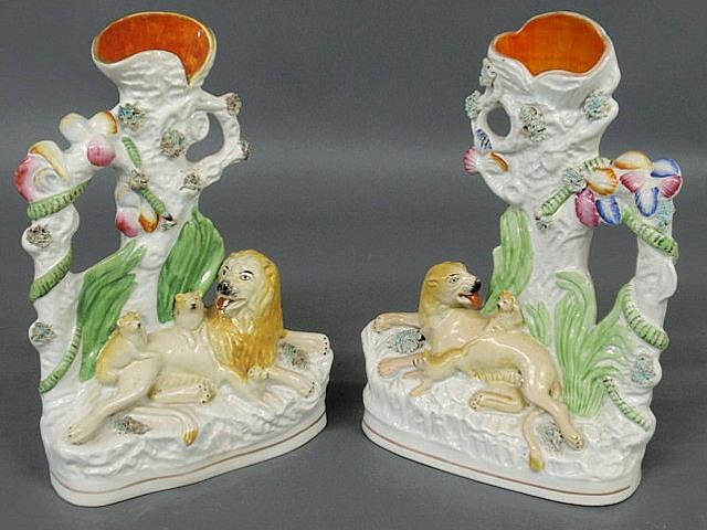 Appraisal: Rare pair of Staffordshire spill vases c with lions and