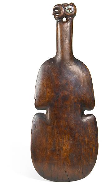 Appraisal: A Maori wood club kotiate paraoa New Zealand with haliotis-shell