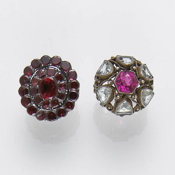 Appraisal: Two garnet synthetic sapphire glass and silver rings garnet broken