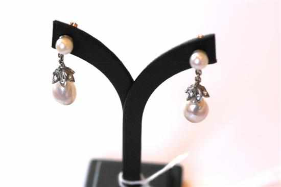 Appraisal: A PAIR OF BAROQUE CULTURED PEARL AND CLEAR STONE SET