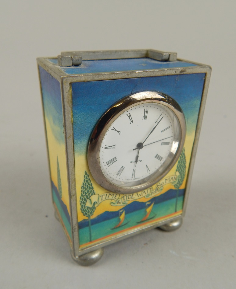 Appraisal: A Roger Lascelles Collection pewter cased travel clock with Roman