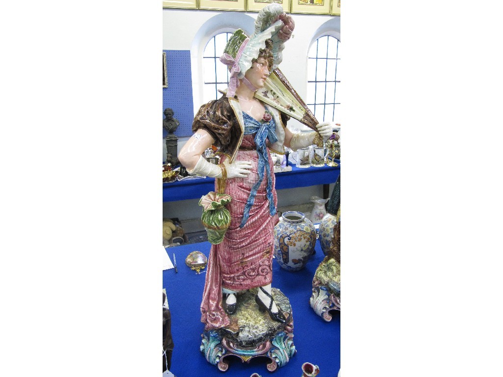 Appraisal: Pair of large Italian Majolica figures the gentleman playing a