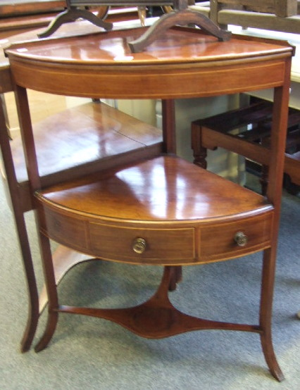 Appraisal: A th century mahogany corner washstand with line inlaid decoration