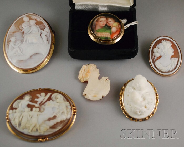 Appraisal: Six Cameo and Portrait Brooches three gold-framed shell-carved cameos a