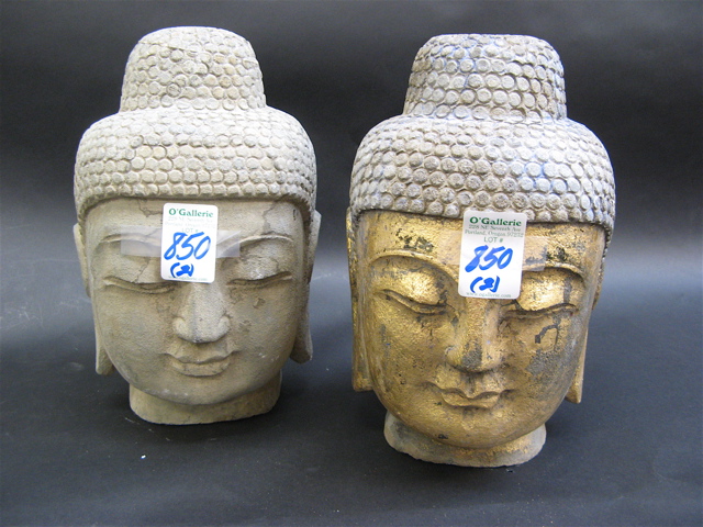 Appraisal: TWO SCULPTED GRANITE HEADS OF GAUTAMA BUDDHA each having downcast