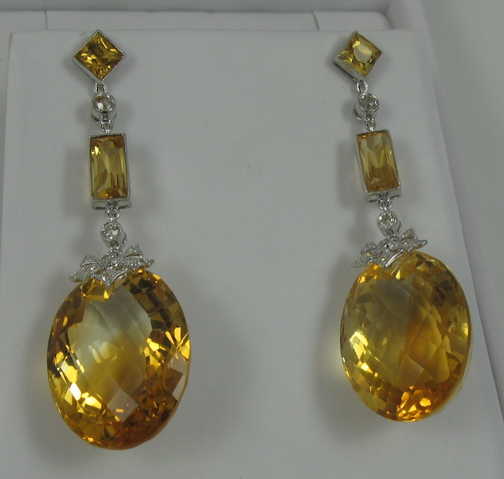 Appraisal: PAIR OF CITRINE DIAMOND AND WHITE GOLD EARRINGS each k