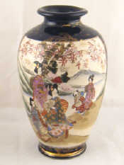 Appraisal: A Japanese ceramic baluster vase with panels of maidens mount