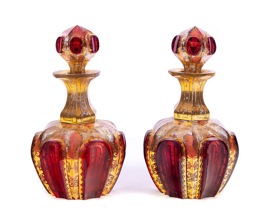 Appraisal: Pair Cranberry Glass Czechoslovakia Bottles with gold Pair Cranberry Glass