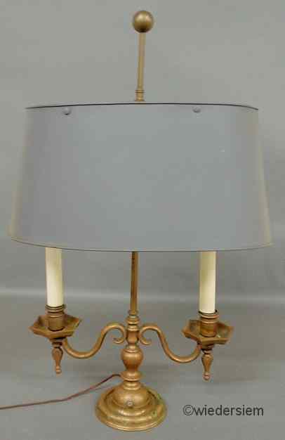 Appraisal: Brass double-arm table lamp with a ball finial and metal