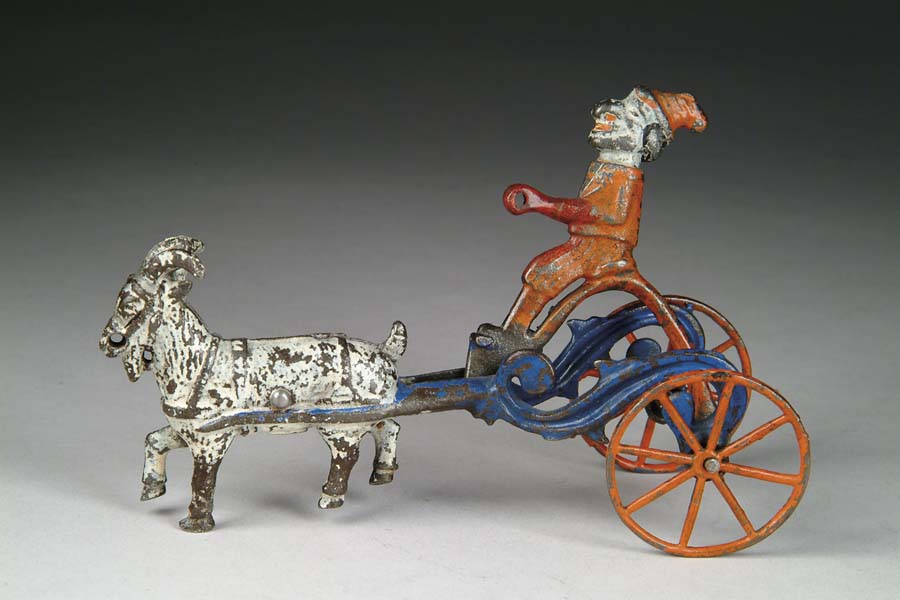 Appraisal: UNUSUAL GOAT DRAWN TOY W PUNCH Of unknown manufacture When