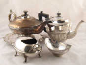 Appraisal: Silver plate A Mappin Bros ovoid spoon warmer on four