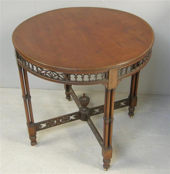 Appraisal: Early twentieth century mahogany lamp table with a pierced frieze