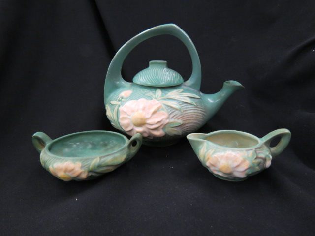 Appraisal: Roseville Pottery Peony Tea Set green teapot is handle repaired