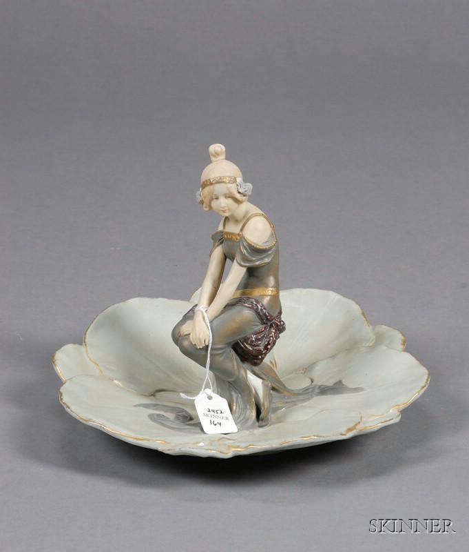 Appraisal: Austrian Porcelain Figural Center Dish early th century modeled as