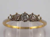 Appraisal: A yellow metal tests carat gold five stone diamond ring