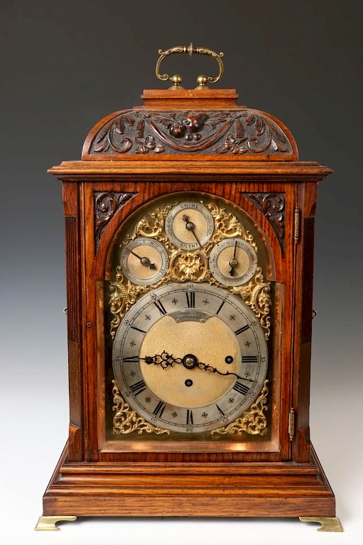 Appraisal: WOOD MANTEL CLOCK RUSSELLS LTD MANCHESTER With wood frame and