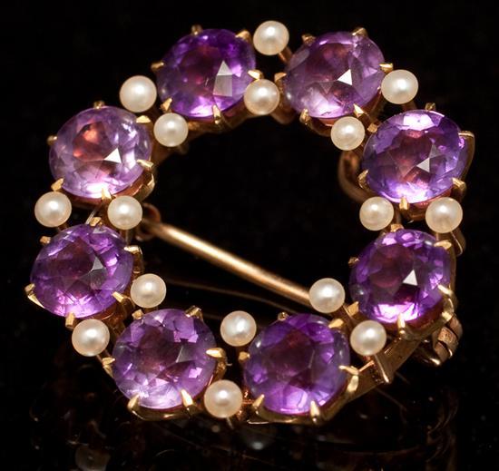 Appraisal: Lady's K yellow gold amethyst and seed pearl circle-form brooch