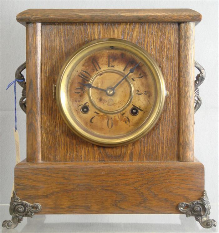 Appraisal: New Haven oak mantle clock metal mounts t s k