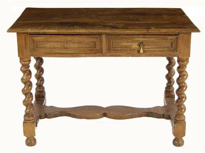 Appraisal: An oak side table the rectangular moulded edge boarded top