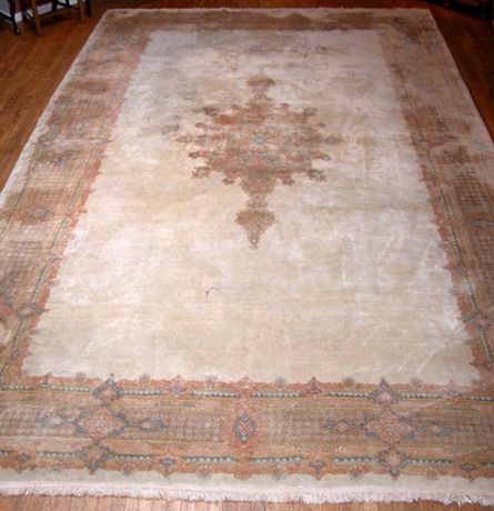 Appraisal: Title Persian Kirman Carpet with central medallion on ivory ground