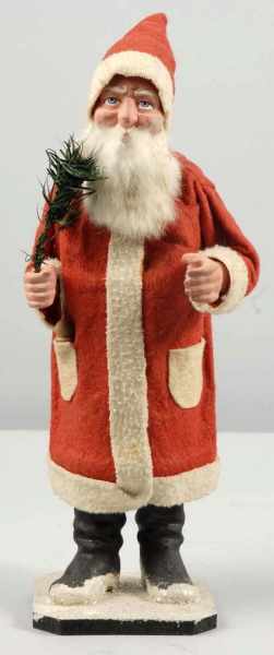 Appraisal: Composition Santa in Red Robe Candy Container Description Rabbit fur