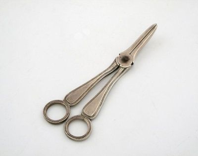 Appraisal: A George III pair of silver Beaded pattern grape scissors