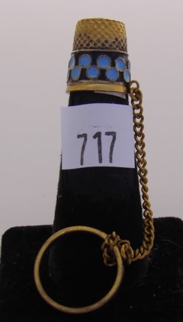 Appraisal: Gold tone blue and black enamel thimble with ring and