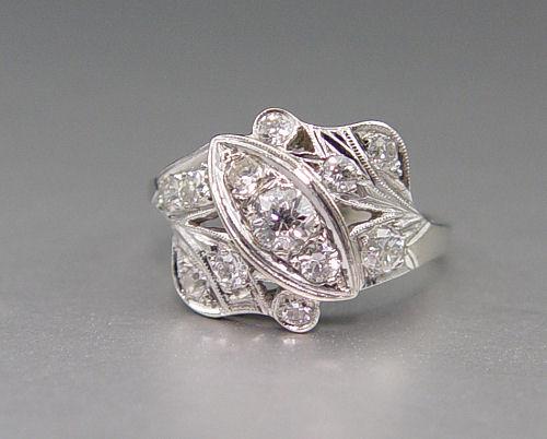 Appraisal: CTW DIAMOND RING K white gold ring contains twelve round