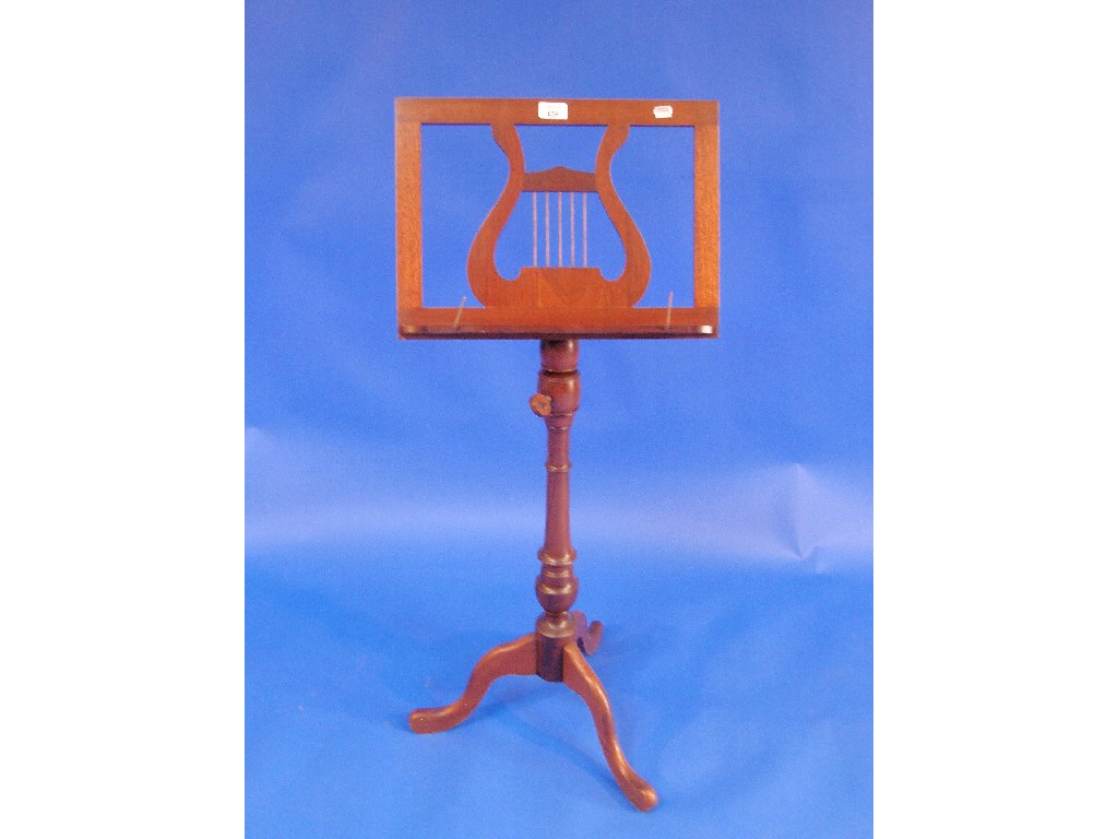 Appraisal: A Victorian mahogany music stand with tripod base