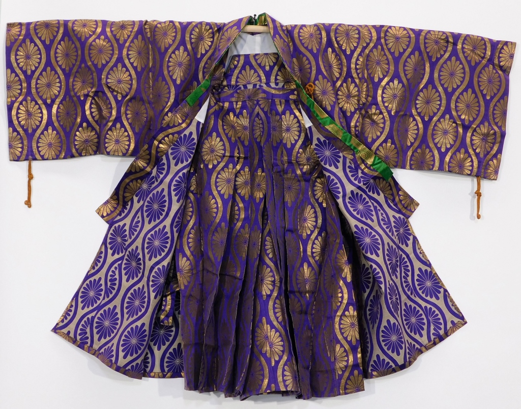 Appraisal: MEIJI PERIOD PURPLE AND GOLD HAORI AND HAKAMA SET Japan