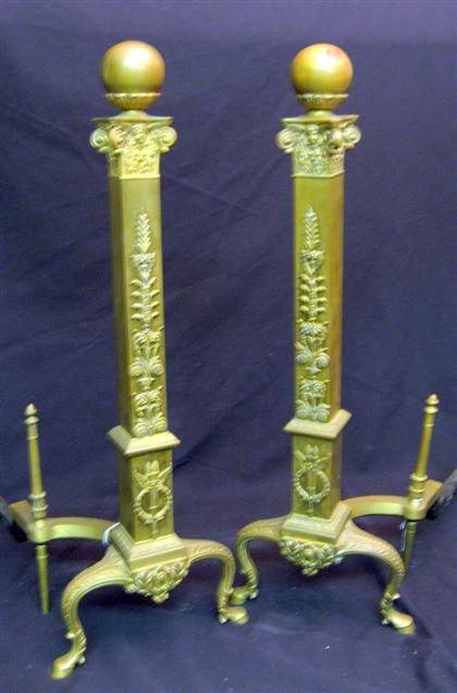 Appraisal: Pair of Neoclassical style gilt metal andirons Each with a