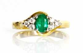 Appraisal: An ct gold emerald and diamond ring estimated total diamond