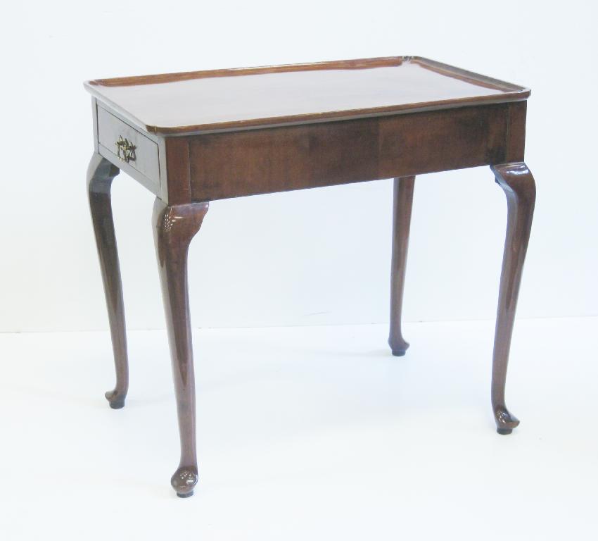 Appraisal: A th Century Silver Table with dished oblong top above