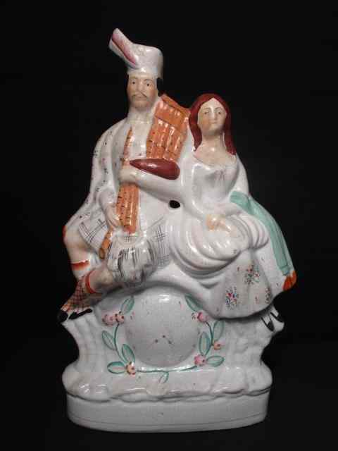 Appraisal: Large th century figure Staffordshire porcelain figurine Condition restoration to