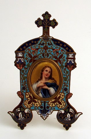 Appraisal: Waist length Virgin Mary or saint in oval x polychrome