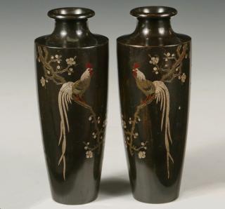 Appraisal: PAIR OF JAPANESE MIXED METAL VASES Meiji Period Rouleau form