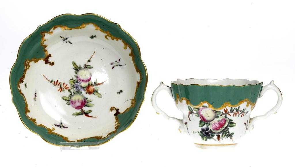 Appraisal: A WORCESTER GREEN GROUND CHOCOLATE CUP AND SAUCER of ogee