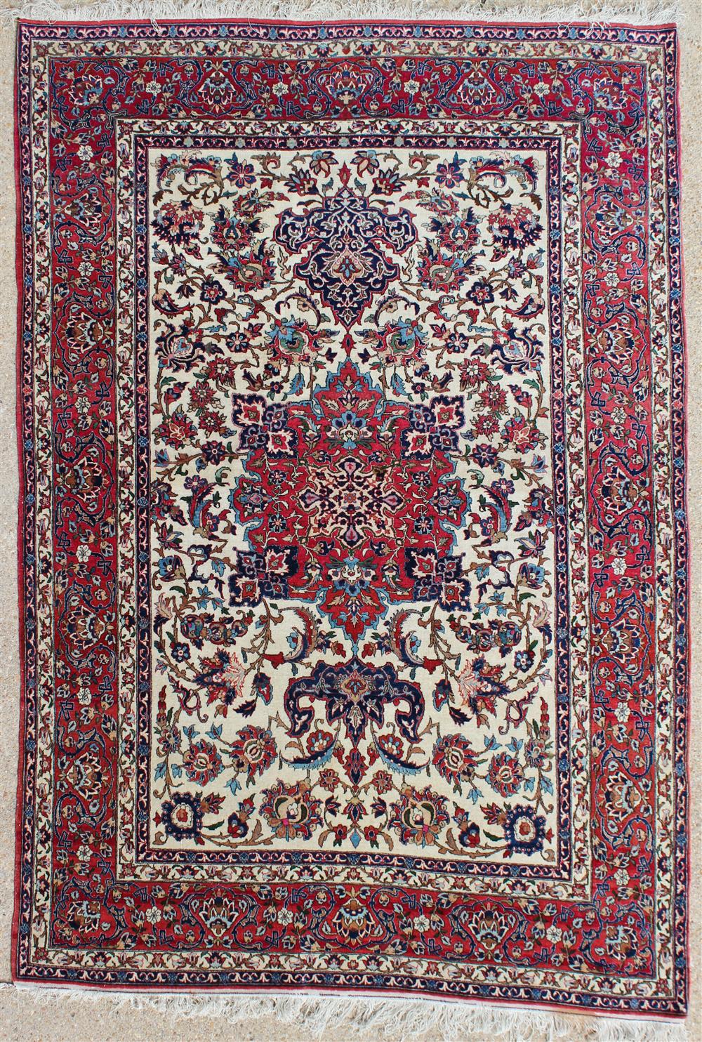 Appraisal: ISFAHAN RUG having a floral pattern with red medallion on