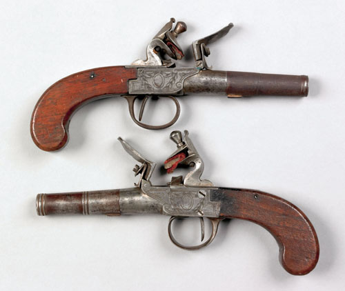 Appraisal: Pair of European flintlock box lock pistols with engraved decoration